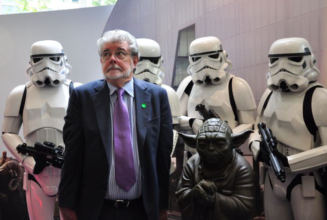Filmmaking legend George Lucas (front L)