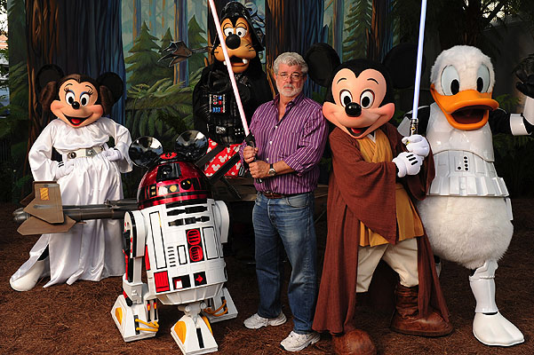 George Lucas Poses With A Group Of "Star Wars" Inspired Disney Characters At Disney's Hollywood Studios